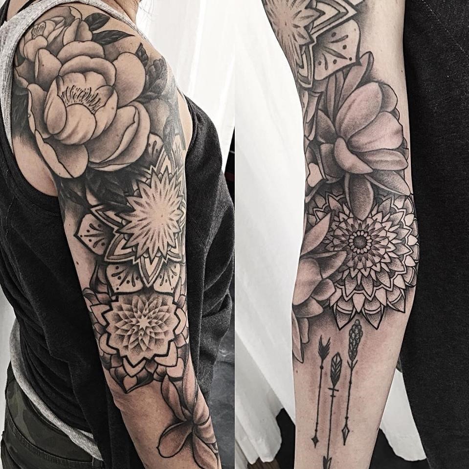 Partial arm sleeve tattoo created by Alan Lott - black and grey fine line tattoo of mandalas and peonies at Sacred Mandala Studio in Durham, NC.